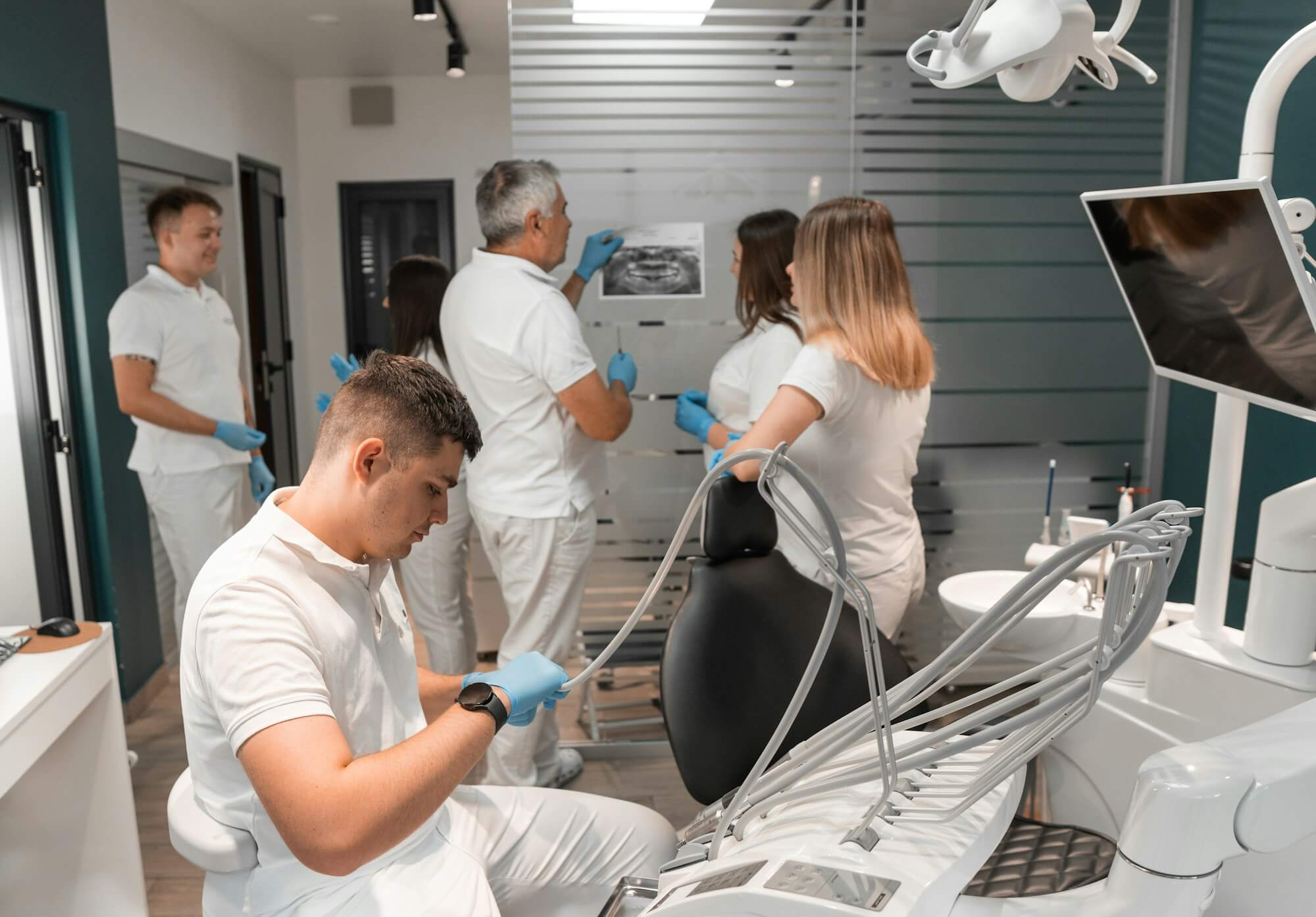 dentists-work-in-dental-office-doctors-discuss-treatment-plan-and-consult-and-consult-with.jpg