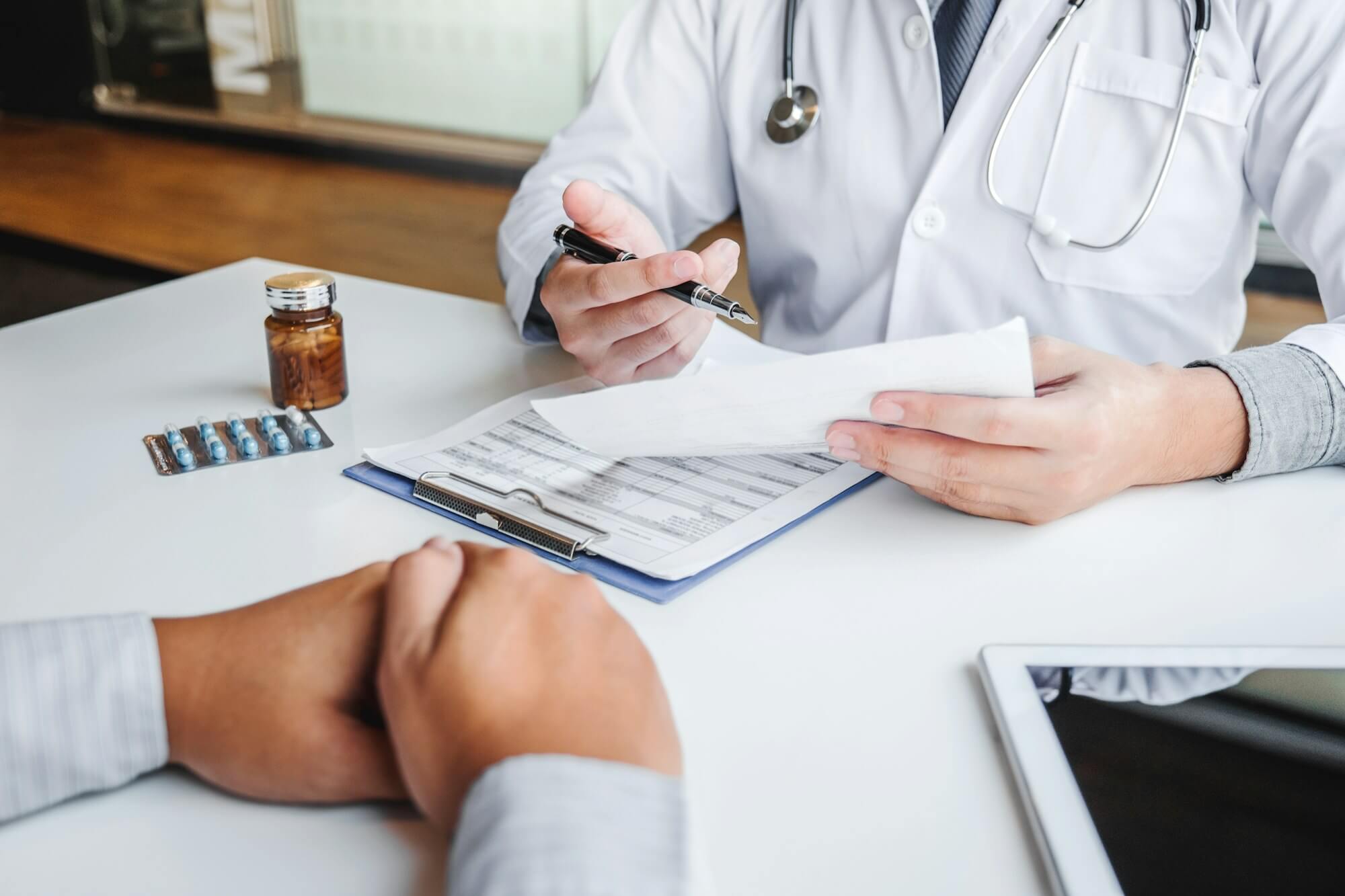 doctor-consulting-with-patient.jpg